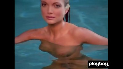 thick boobed platinum-blonde Kimberly Holland taking off her splendid uniform outdoor